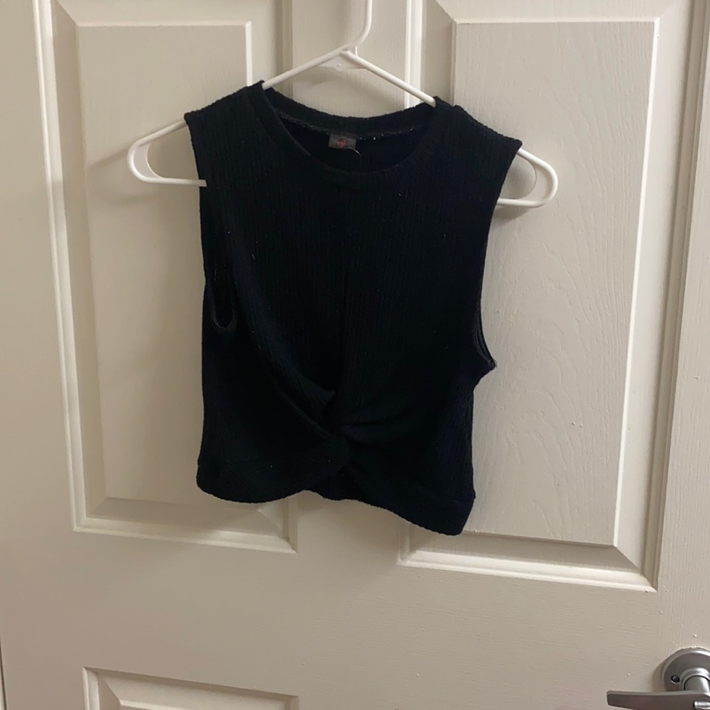 Soft black crop sweater. Never been warn. Purchased from a boutique.